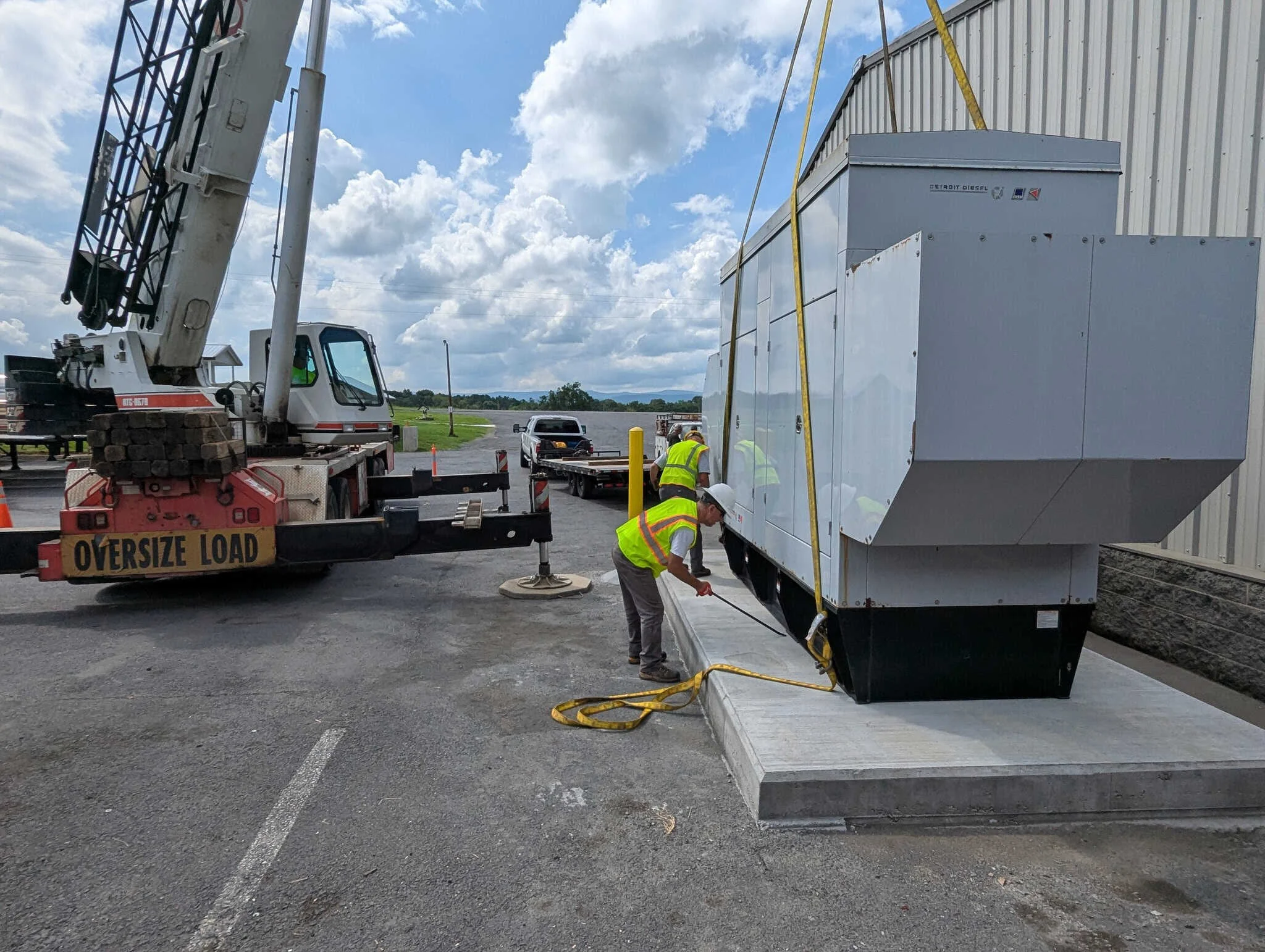 Generator being installed by crane
